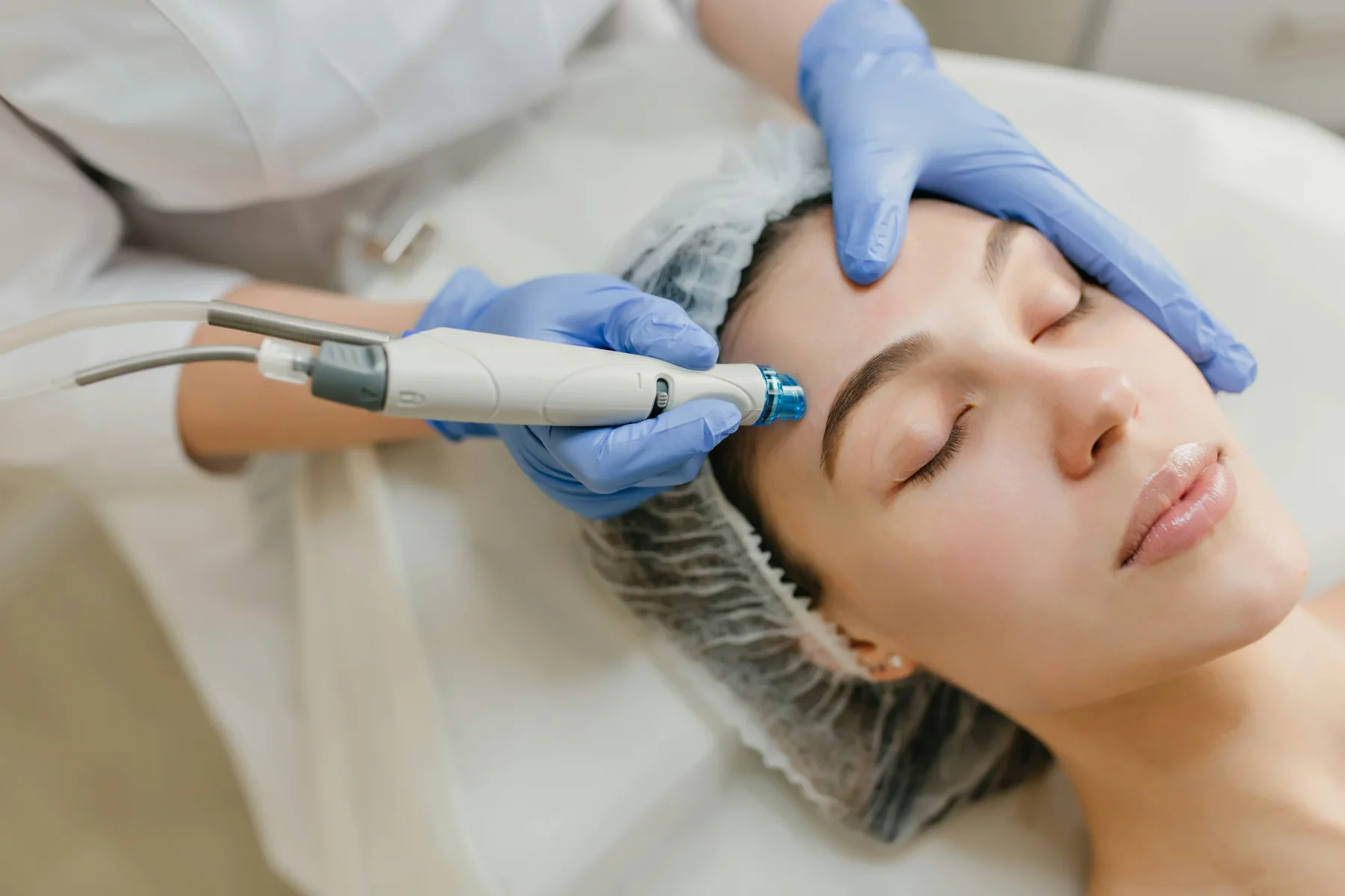 Professional facial treatment in a calm beauty studio
