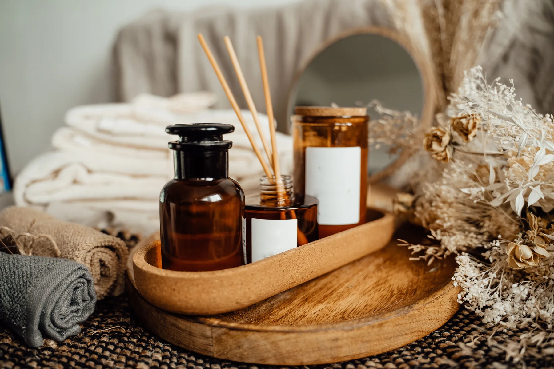 Aromatherapy oils, towels, and dried botanicals