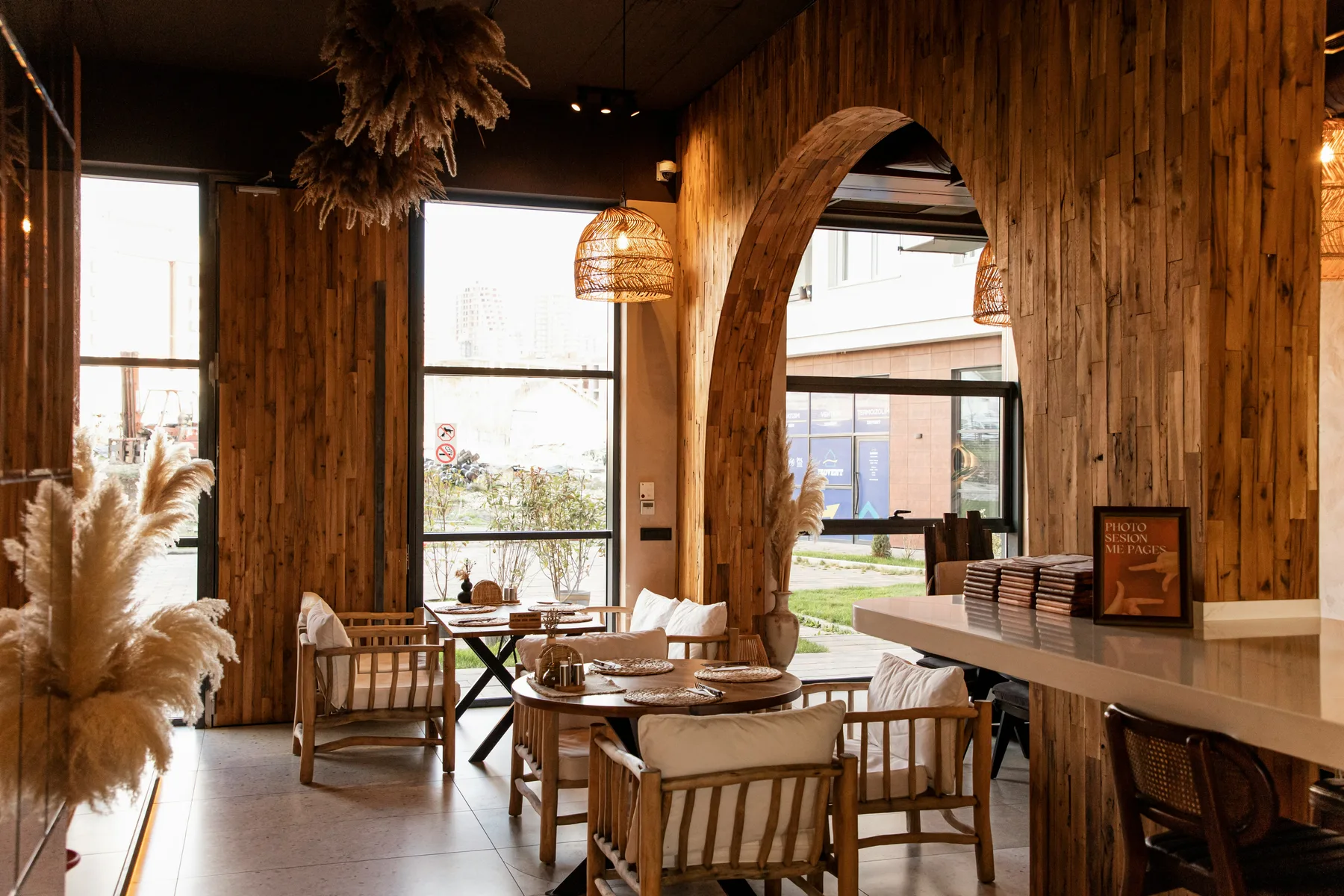 Warm restaurant interior with wood and natural light